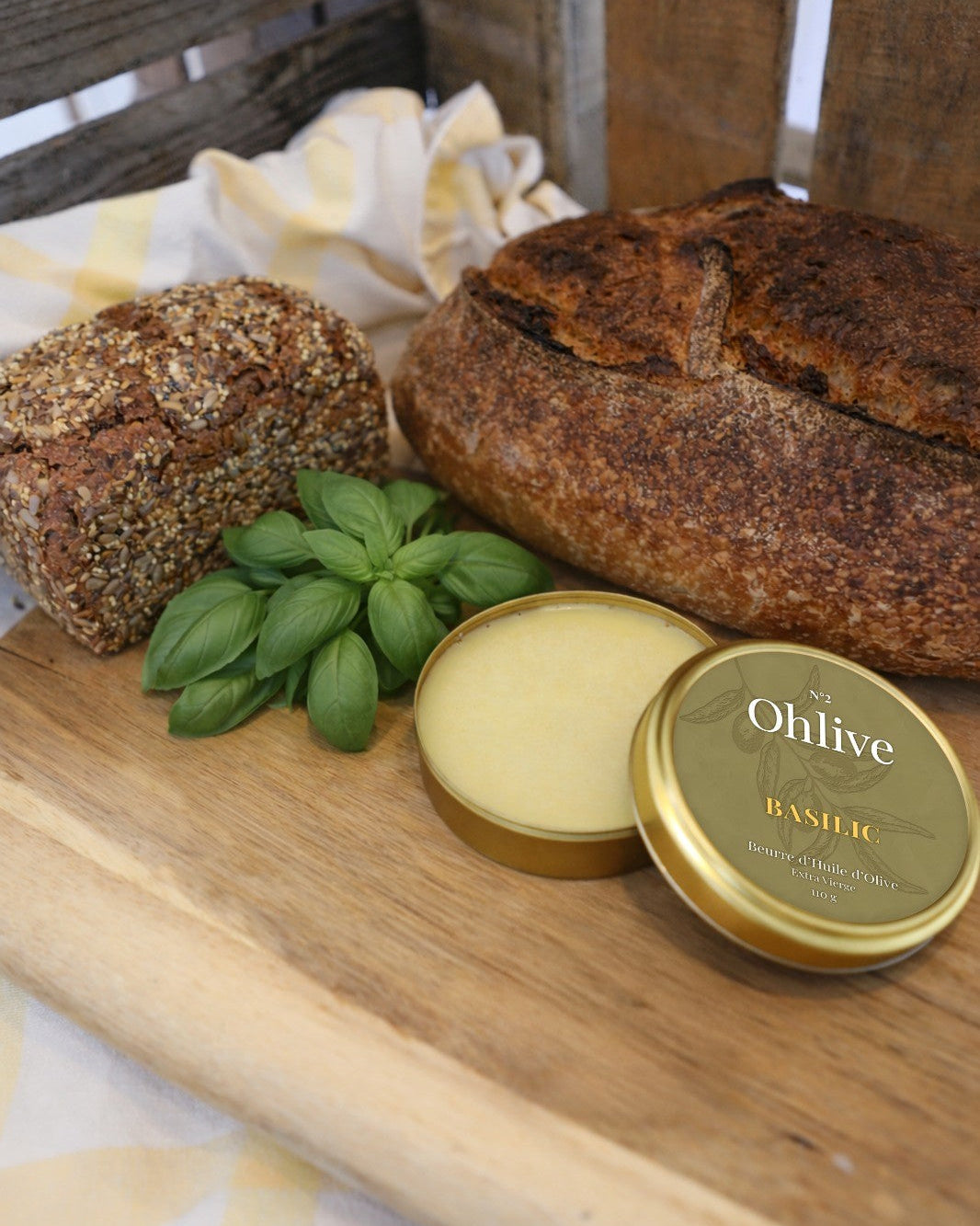 basil olive oil butter served with artisanal bread and fresh basil