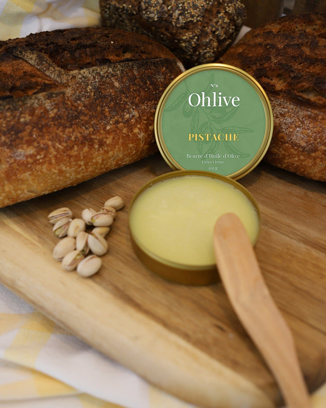 pistachio olive oil butter served with artisanal bread and pistachios